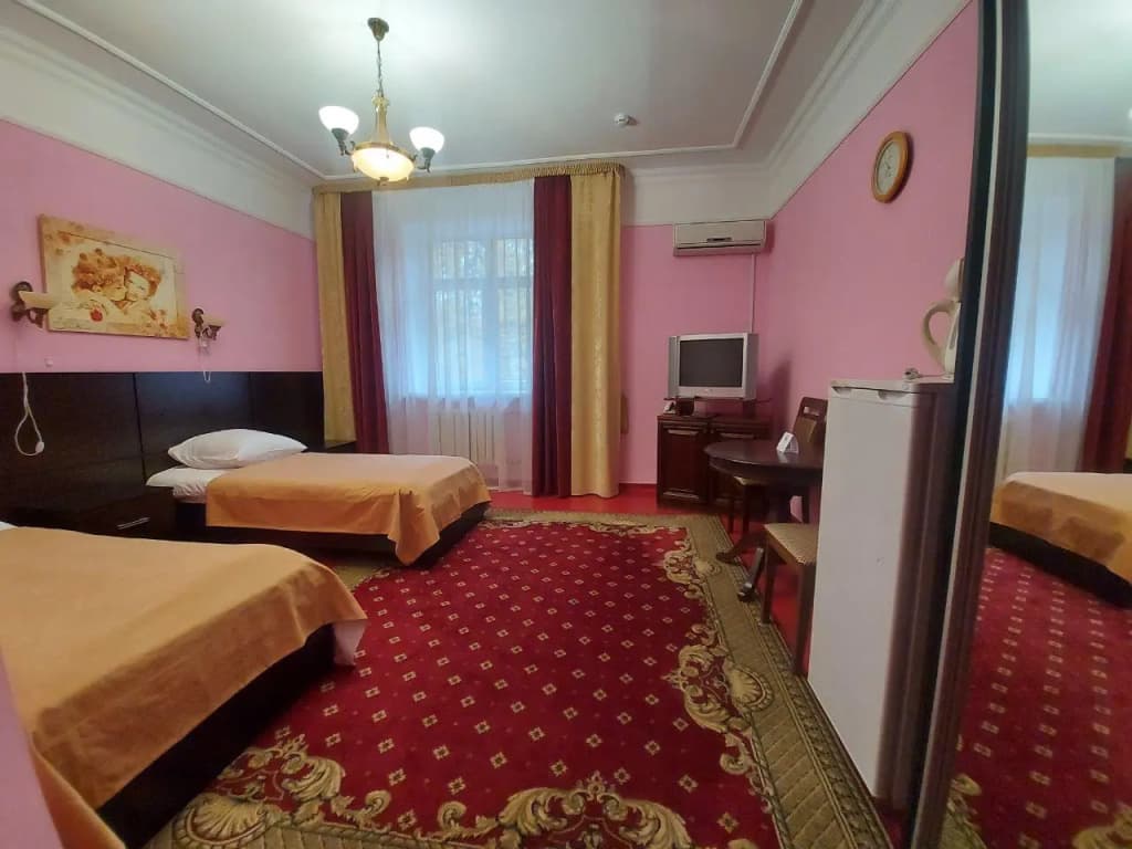 Двухместный номер Standard (2 отдельные кровати) фото 1