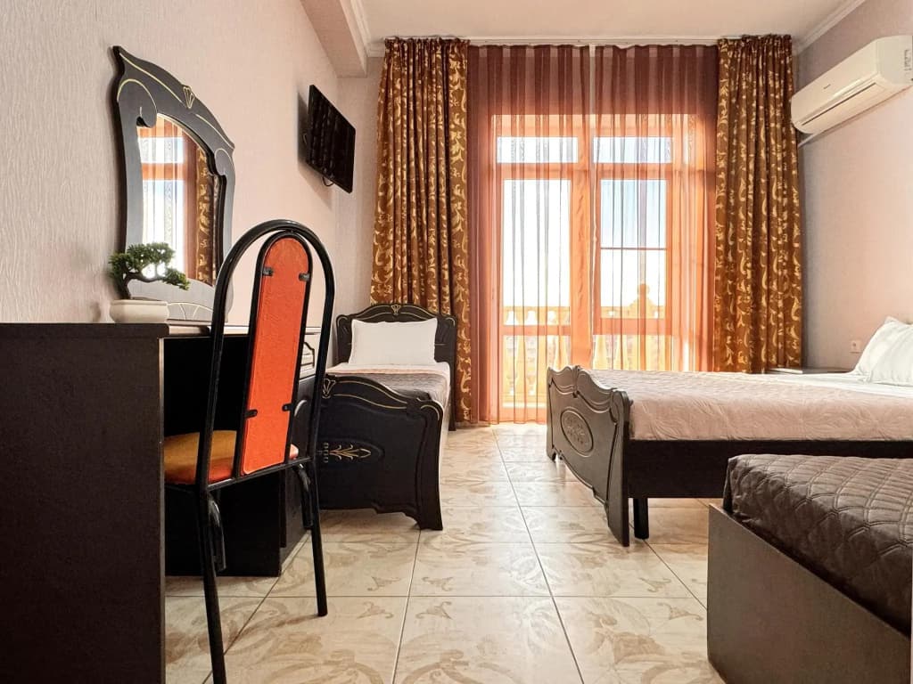 Четырёхместный номер Comfort с балконом фото 4