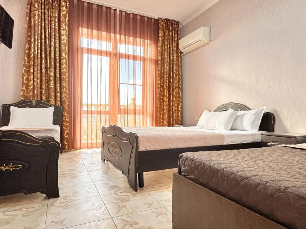 Четырёхместный номер Comfort с балконом фото 13