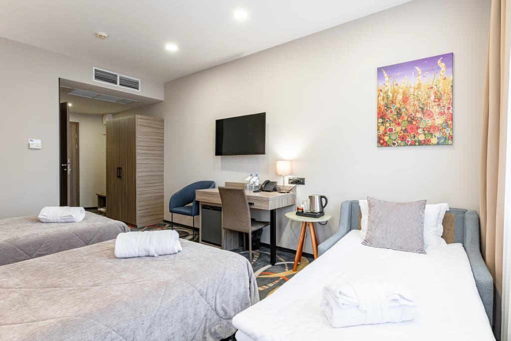 Двухместный номер Комфорт+ (улучшенный) 2 отдельные кровати фото 10