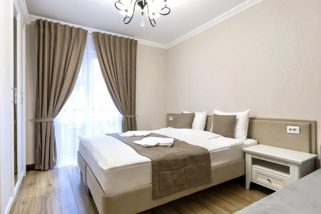 Двухместный номер Comfort с балконом и с видом на горы двуспальная кровать фото 11