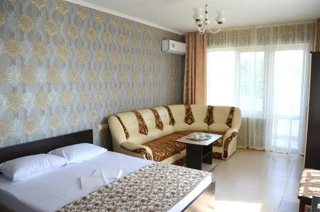 Двухместный номер Deluxe с балконом и с видом на море двуспальная кровать фото 1