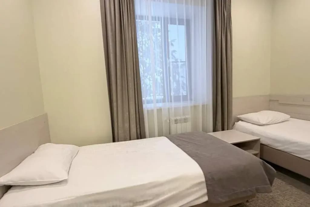 Двухместный номер Стандарт 2 отдельные кровати фото 2