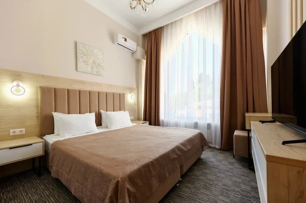 Апарт Плюс с 3 комнатами фото 1