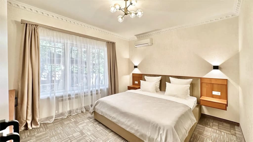 Двухместный номер Standard Comfort (коттеджи) двуспальная кровать фото 1