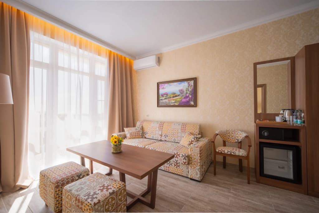 Двухместный люкс Premium с балконом и с видом на море двуспальная кровать фото 2