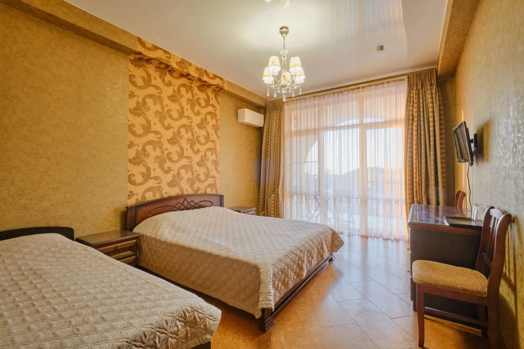 Трёхместный номер Standard с балконом фото 1