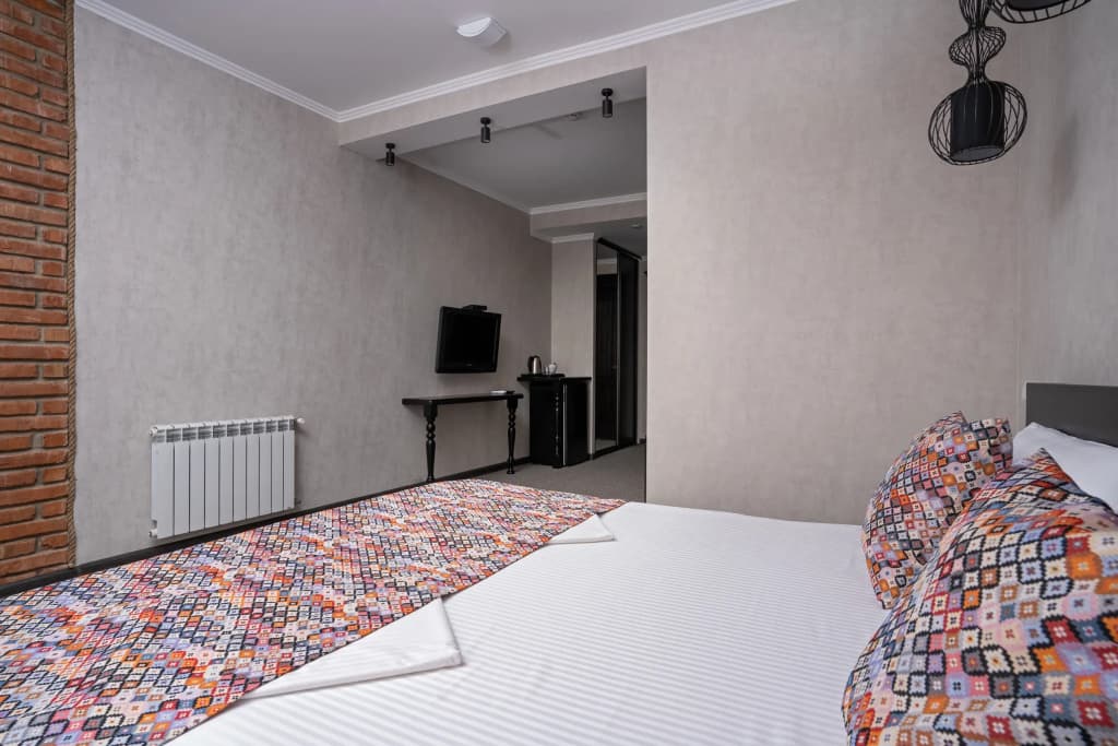 Двухместный номер Deluxe с балконом двуспальная кровать фото 2