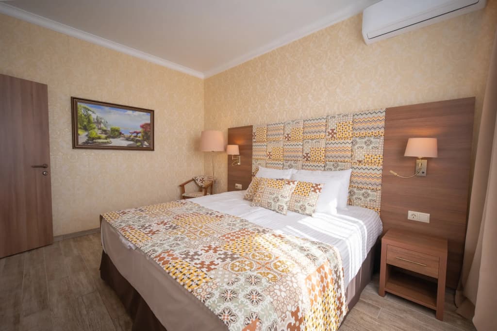 Двухместный люкс Premium с балконом и с видом на море двуспальная кровать фото 3