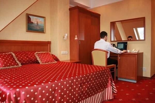 Двухместный номер Standard Мансарда с частичным видом на море 2 отдельные кровати фото 3