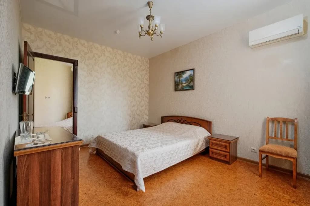 Трёхместный люкс с 2 комнатами с балконом фото 3