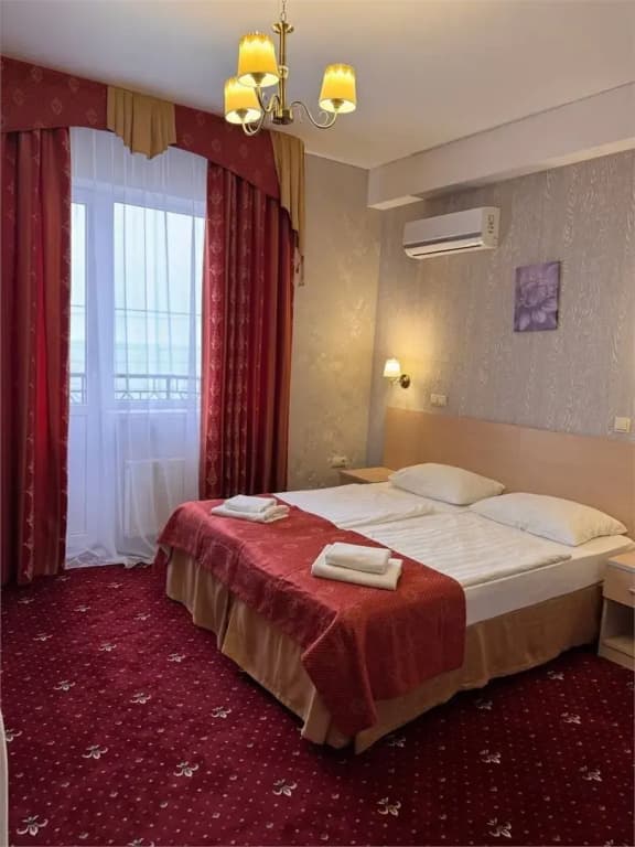 Двухместный номер Standard Superior с балконом двуспальная кровать фото 1