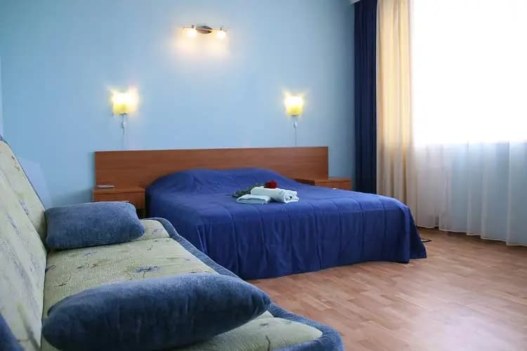 Двухместный номер Premium Comfort c 1 комнатой с балконом двуспальная кровать
