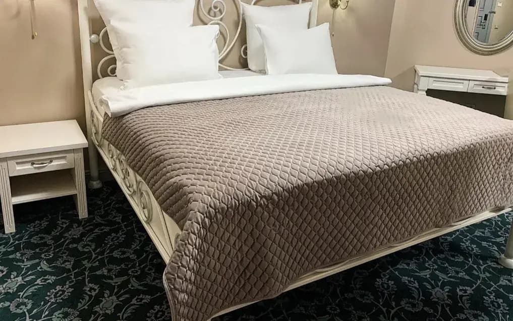 Двухместный номер Купеческий Superior двуспальная кровать